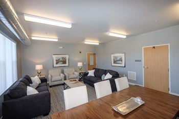 Community rooms in both buildings